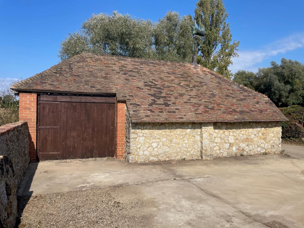 Lot: 64 - PERIOD MILL & MILL HOUSE, TWO ADDITIONAL DWELLINGS, OUTBUILDINGS AND SWIMMING POOL SET IN ALMOST FIVE AND A HALF ACRES - Swanton Garage/workshop